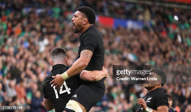 Will Jordan of New Zealand celebrates scoring his team's third try with teammate Ardie Savea during the Rugby World Cup France 2023 Quarter Final...