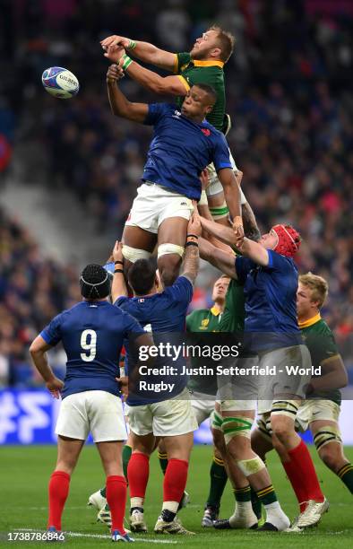 Duane Vermeulen of South Africa and Cameron Woki of France contest the line out during the Rugby World Cup France 2023 Quarter Final match between...