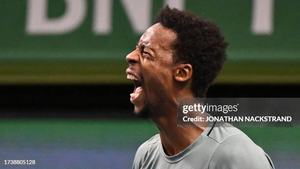 France's Gael Monfils celebrates winning the second set against Russia's Pavel Kotov during the men's singles final match of the ATP Nordic Open...