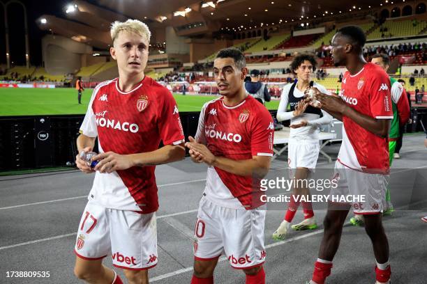 Monaco's French forward Wissam Ben Yedder and Monaco's Russian midfielder Aleksandr Golovin celebrate at the end of the French L1 football match...