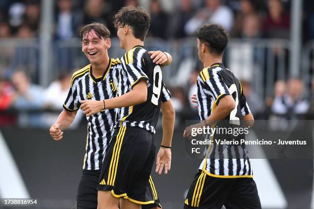 Fabio Badarau of Juventus U16 celebrates a goal with team mates Francesco Sturniolo and Lorenzo Cancila during the match between Juventus U16 and...