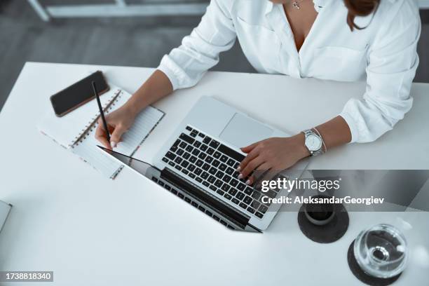 female freelance translator starting her workday - translation stock pictures, royalty-free photos & images