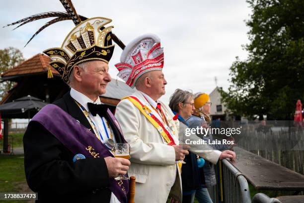 The judges of the pumpkin regatta competition watch the preparatives ahead of the start of the competition on October 22, 2023 in Kasterlee, Belgium....