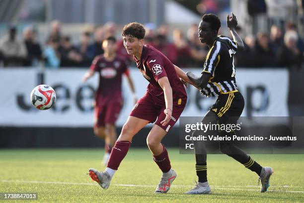 Demba Sall Samb of Juventus U16 is challenged during the match between Juventus U16 and Torino U16 at Juventus Center Vinovo on October 22, 2023 in...