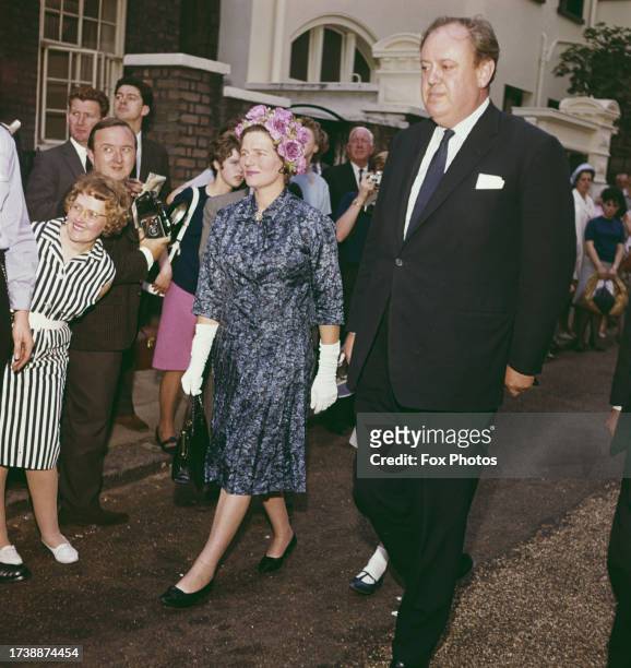 British Conservative Party politician Christopher Soames and his wife Mary at Hyde Park Gate in London, July 28th 1964. They are attending an...