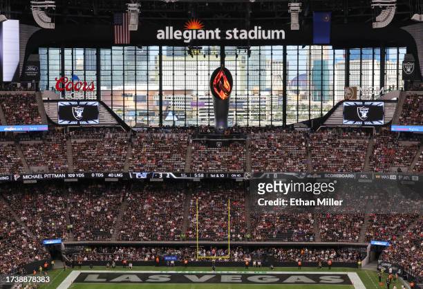 General view shows the Las Vegas Strip outside the lanai doors at Allegiant Stadium behind the Al Davis Memorial Torch during the first quarter of a...