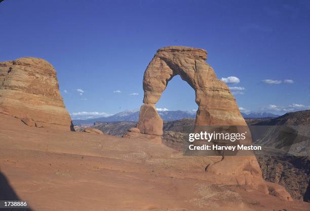 View of Delicate Arch sandstone rock formation at Arches National Park, near Moab, Utah, 1960s.