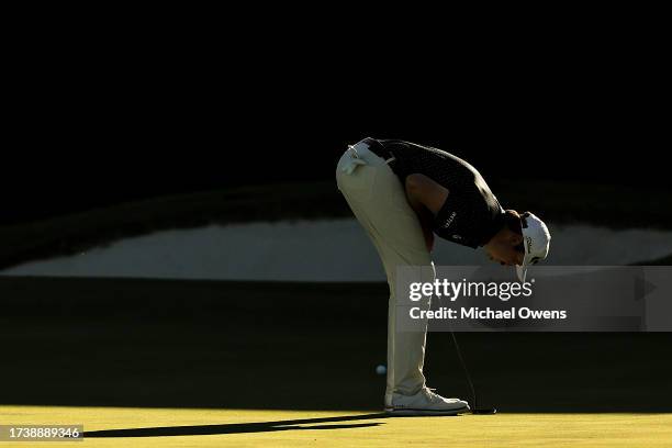 Poston of the United States reacts on the 18th green after missing a putt during the final round of the Shriners Children's Open at TPC Summerlin on...