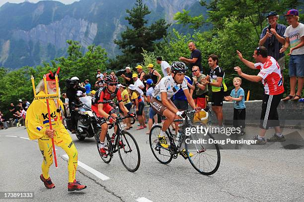 Stage winner Christophe Riblon of France and Team AG2R La Mondiale and Tejay van Garderen of the United States and BMC Racing Team pass cycling fan...