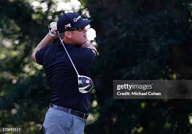 Points hits a drive during the first round of the John Deere Classic held at TPC Deere Run on July 11, 2013 in Silvis, Illinois.