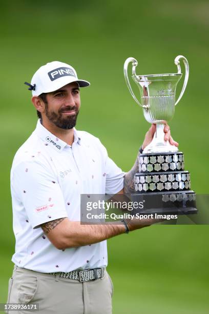 Matthieu Pavon of France poses with the winner's trophy of the acciona Open de Espana on Day Four of the acciona Open de Espana presented by Madrid...