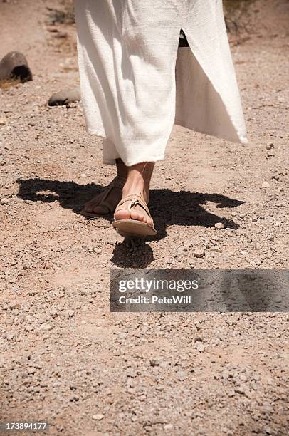 close up of jesus walking in the dessert - jesus walking stock pictures, royalty-free photos & images