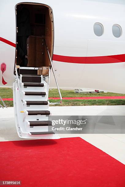 biz jet and red carpet - private aeroplane stock pictures, royalty-free photos & images