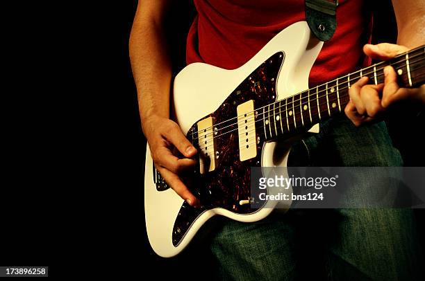 a rock and roll style guitar being played - classic rock stock pictures, royalty-free photos & images