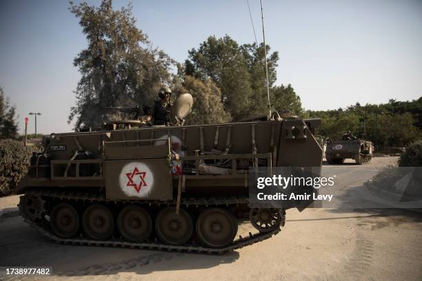 Israeli armored personnel carriers seen after the Hamas and Palestinians militants attack on the Kibbutz on October 22, 2023 in Be'eri, Israel. As...