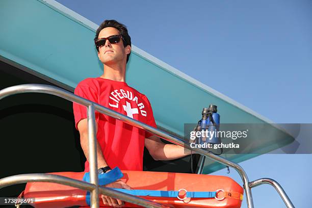 beach lifeguard on tower - lifeguard stock pictures, royalty-free photos & images
