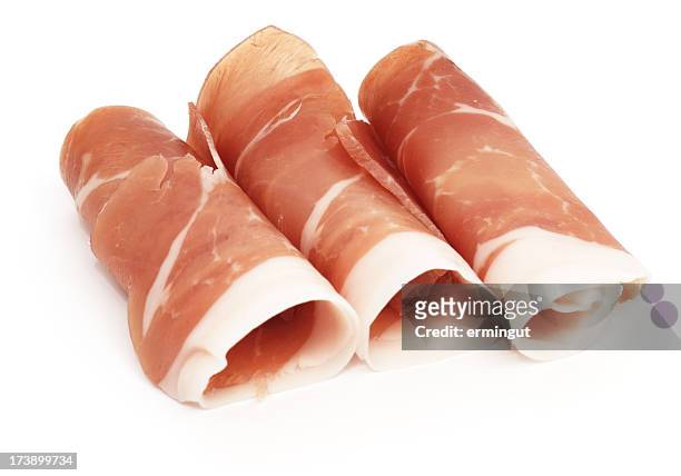 cured ham rolls - prosciutto isolated on white - prosciutto stock pictures, royalty-free photos & images