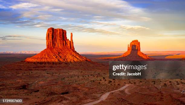 monument valley mitten shadow event - rock formation stock pictures, royalty-free photos & images