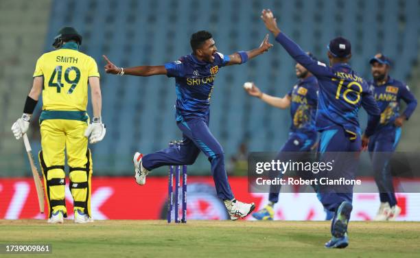 Dilshan Madushanka of Sri Lanka celebrates the wicket of Steve Smith of Australia during the ICC Men's Cricket World Cup India 2023 between Australia...