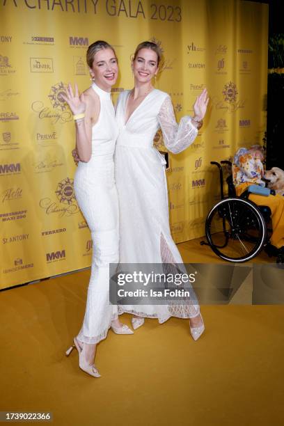 Nina Meise and Julia Meise attend the VITA Charity Gala on October 14, 2023 in Wiesbaden, Germany.