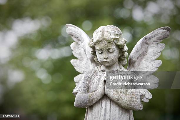 stone cherub praying - female angel of death stock pictures, royalty-free photos & images