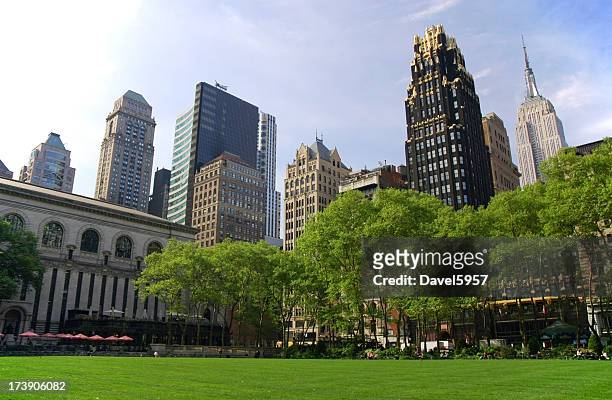 midtown manhattan skyscrapers and bryant park - new york city park stock pictures, royalty-free photos & images