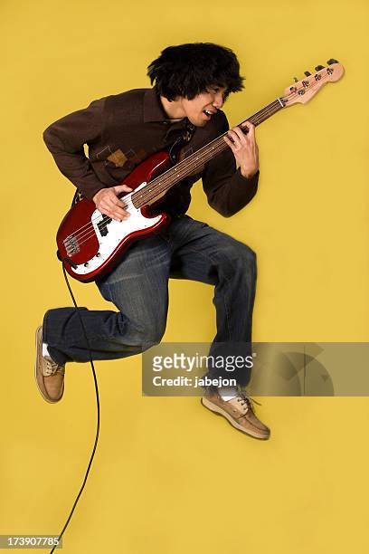 rock on - bass guitar stock pictures, royalty-free photos & images