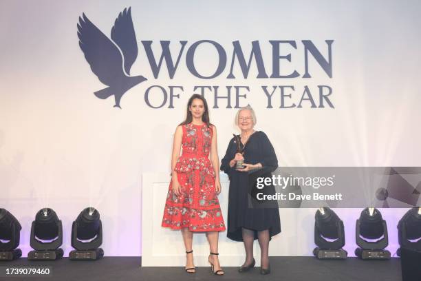 Felicity Jones and Brenda Hale, Baroness Hale of Richmond attend the Women of the Year Lunch & Awards at The Royal Lancaster Hotel on October 16,...