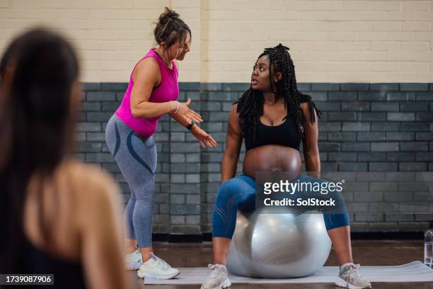 getting the most out of the class - yoga ball work stock pictures, royalty-free photos & images