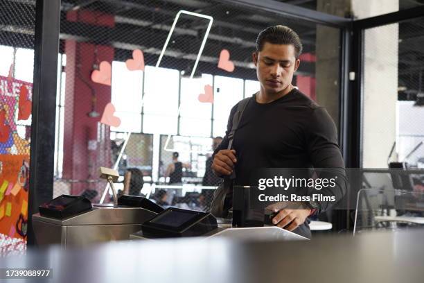 athlete training at the gym to start his exercise routine - fingerprint scanner stock pictures, royalty-free photos & images