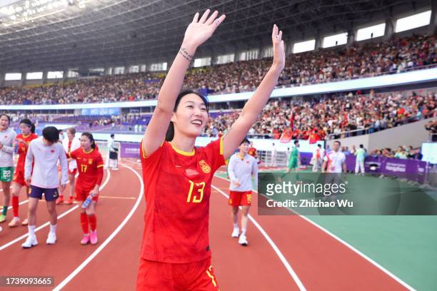 Yang Lina of China thanks the fans after the 19th Asian Game Women's bronze medal match between China and Uzbekistan at Huanglong Sports Centre...