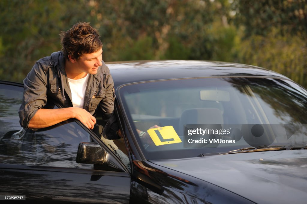 Learner Driver attaching L Plate