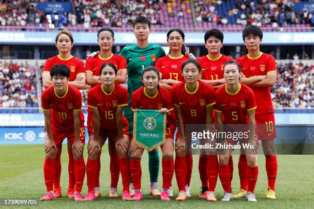 Players of China line up for team photo during the 19th Asian Game Women's bronze medal match between China and Uzbekistan at Huanglong Sports Centre...