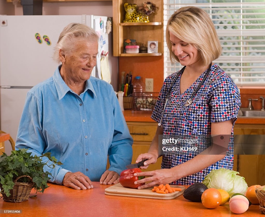 Client and Homecare Nurse in a home kitchen