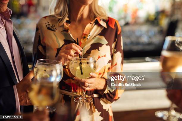 an afternoon drink with friends - afternoon stock pictures, royalty-free photos & images