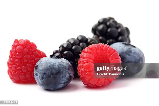 mixed berries - summer fruits stockfoto's en -beelden
