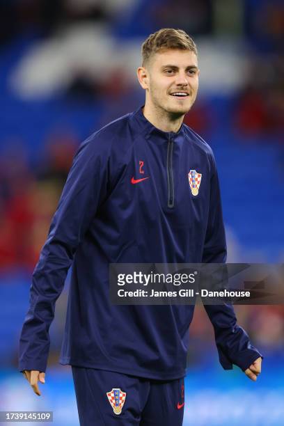 Josip Stanisic of Croatia during the UEFA EURO 2024 European qualifier match between Wales and Croatia at Cardiff City Stadium on October 15, 2023 in...