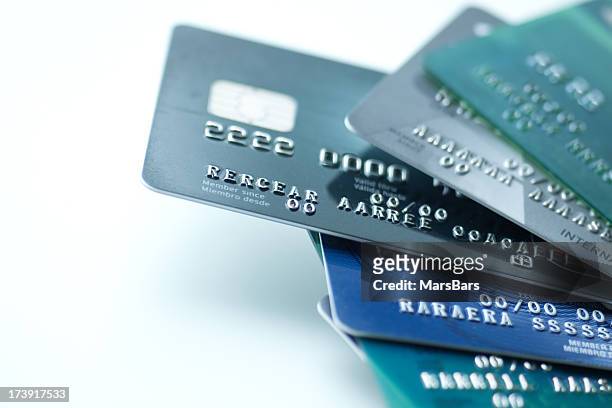 credit cards on white background - credit card and stapel stockfoto's en -beelden