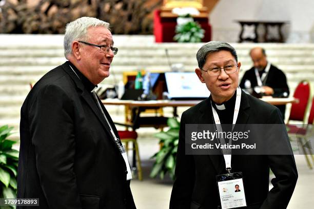 Former Archbishop of Manila Luis Antonio G. Tagle chats with Archbishop of Luxembourg and the Relator General of the Synod cardinal Jean-Claude...