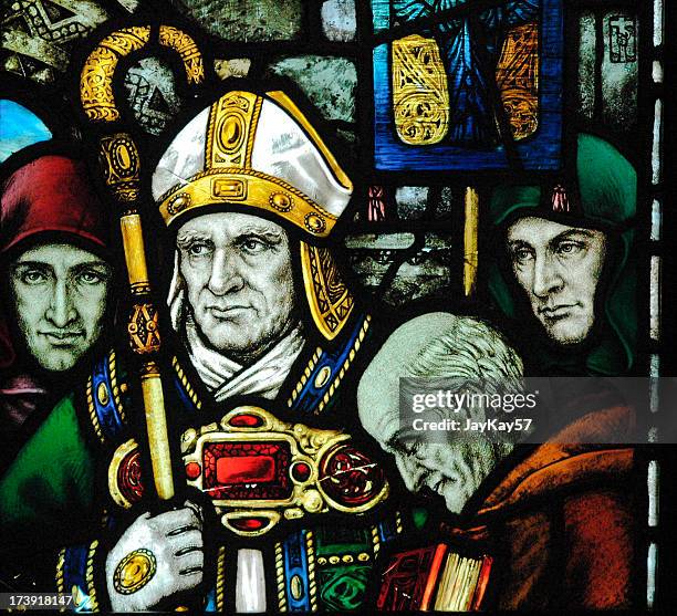 glass art of saint patrick close-up - st-patrick-stained-glass stock pictures, royalty-free photos & images