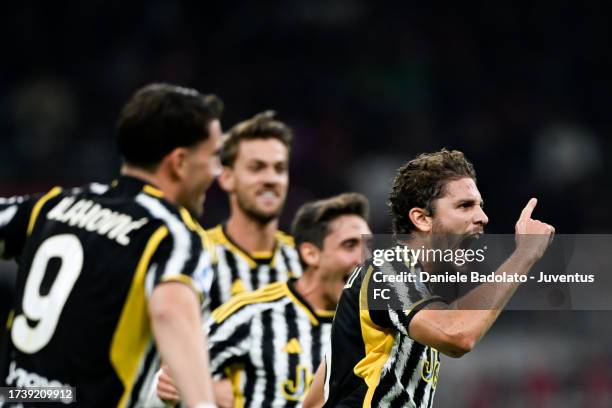 Manuel Locatelli of Juventus celebrates 0-1 goal during the Serie A TIM match between AC Milan and Juventus at Stadio Giuseppe Meazza on October 22,...