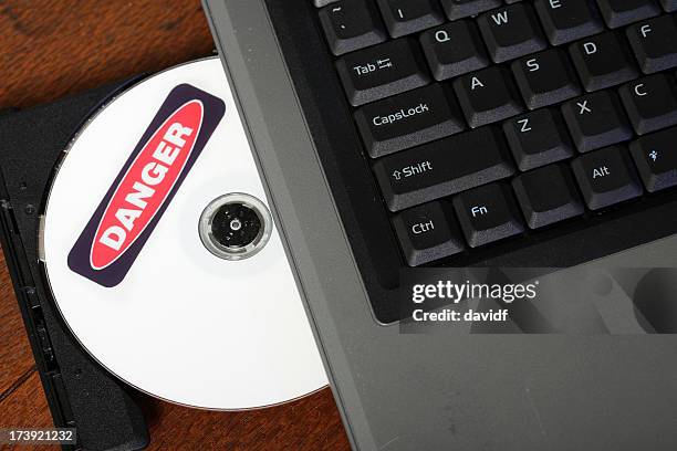 dangerous computer disc - terrorism icon stock pictures, royalty-free photos & images