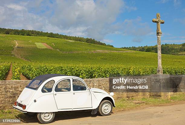 retro car in a vineyard - burgundy vineyard stock pictures, royalty-free photos & images