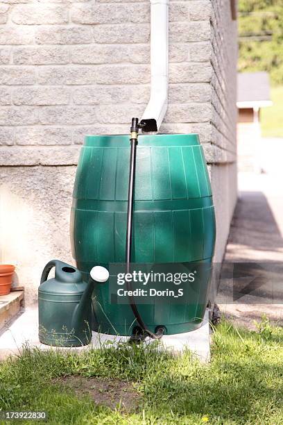 rain barrel water conservation - collecting rainwater barrel stock pictures, royalty-free photos & images