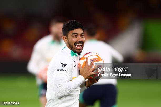 Massimo Luongo of Australia warms up during the Australia Subway Socceroos Training Session at Gtech Community Stadium on October 16, 2023 in London,...