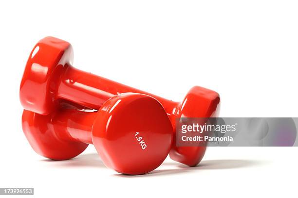 red dumbbell weights - mass unit of measurement stock pictures, royalty-free photos & images
