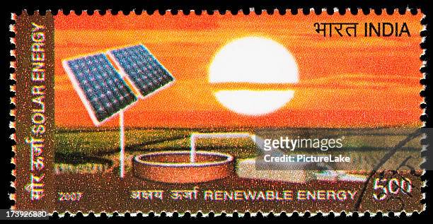 solar renewable energy postage stamp - renewable energy india stock pictures, royalty-free photos & images
