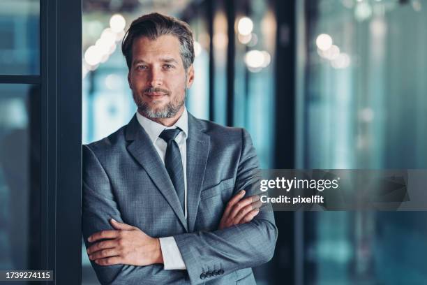 trust and responsibility are important for our business - male portrait suit and tie 40 year old stock pictures, royalty-free photos & images