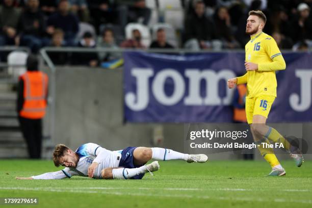 James McAtee of England goes down with an injury during the Ukraine U-21 v England U-21 UEFA Under-21 EURO 2025 Qualifier match at Kosicka futbalova...