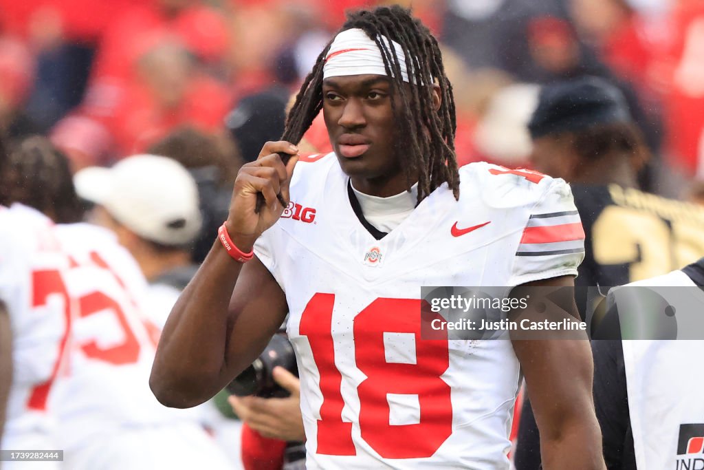 Harrison Purdue Marvin Harrison Jr. #18 of the Ohio State Buckeyes on the field after ...